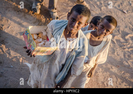 Khartoum, Sudan - Dec 19, 2015: Young Sudanese boy posing on a market. Stock Photo