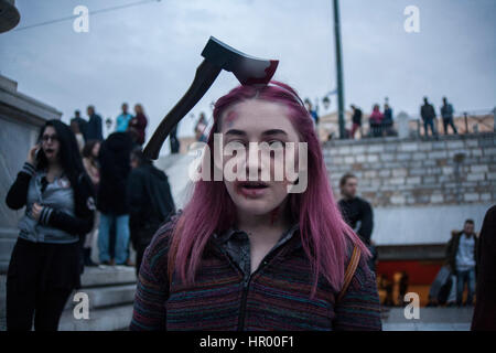 Athens, Greece. 25th Feb, 2017. Hundreds of people take part in the Zombie Walk 2017 dressed as zombies while roaming the center of Athens. Credit: George Panagakis/Pacific Press/Alamy Live News Stock Photo