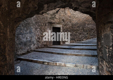 Medieval passage with stairs in Old Jewish Quarter, city of Girona in Catalonia, Spain Stock Photo