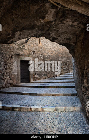 Medieval passage with staircase in Old Jewish Quarter - The Call in city of Girona in Catalonia, Spain Stock Photo