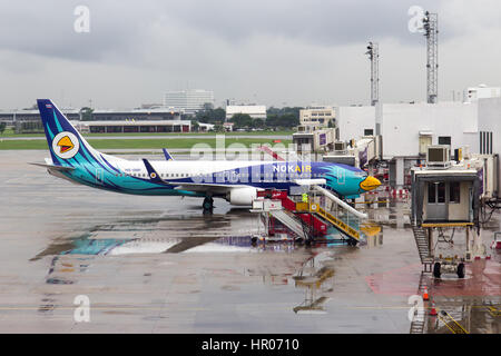 airplane Nok Air parked in the airport Don Muang, Bangkok, Thailand Stock Photo