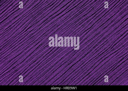 Dark purple crinkled fabric with irregular diagonal lines textile abstract background texture Stock Photo