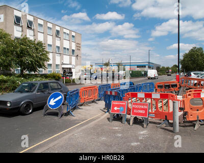 Road works with safety barriers blocking pedestrian footpath Stock Photo