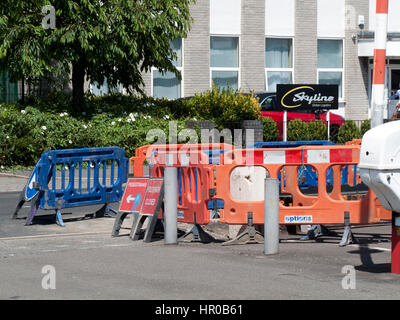 Road works with safety barriers blocking pedestrian footpath Stock Photo