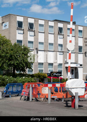 Road works with safety barriers blocking pedestrian footpath Stock Photo