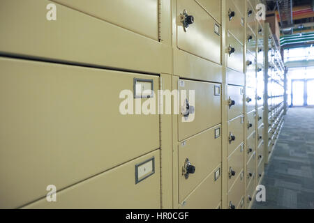 Rows of lockers in a university building hallway. Stock Photo