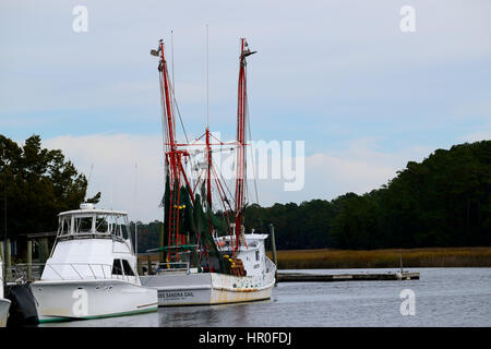 Work boats docked along the Calabash River Stock Photo