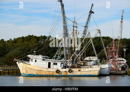 Shrimp boats at dock on the Intercoastal Water way in Holden Beach, NC Stock Photo