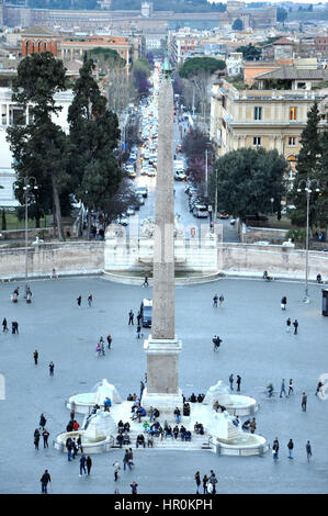 ROME, ITALY - MARCH 14, 2016: Tourists visiting the Piazza del Popolo in Rome, one of major squares of the city Stock Photo