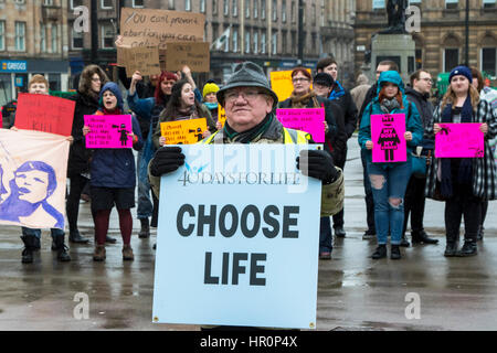 Glasgow, Scotland, UK. 25th Feb, 2017. '40 Days for Life', a Christian Pro-Life and anti abortion group held a prayer meeting in George Square, Glasgow, in preparation for 40 days of prayer, beginning on Ash Wednesday (1 March) and ending on Palm Sunday (9 April), hoping to have the Scottish Executive repeal the Abortion Act 1967. The prayer meeting was confronted by counter demonstration of activists promoting international womens' rights and advocating the 'Right to Choose' Credit: Findlay/Alamy Live News