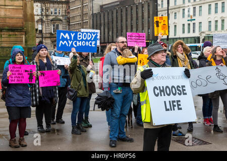 Glasgow, Scotland, UK. 25th Feb, 2017. '40 Days for Life', a Christian Pro-Life and anti abortion group held a prayer meeting in George Square, Glasgow, in preparation for 40 days of prayer, beginning on Ash Wednesday (1 March) and ending on Palm Sunday (9 April), hoping to have the Scottish Executive repeal the Abortion Act 1967. The prayer meeting was confronted by counter demonstration of activists promoting international womens' rights and advocating the 'Right to Choose' Credit: Findlay/Alamy Live News