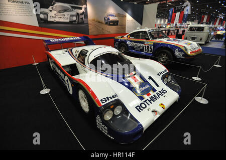 A Porsche 956 famously driven by Jacky Ickx and Derek Bell in the Silverstone 6 Hours race on display at the London Classic Car Show which is taking place at ExCel London.  More than 800 of the world's finest classic cars are on display at the show ranging from vintage pre-war tourers to a modern concept cars.  The show brings in around 33,000 visitors. ranging from serious petrol heads to people who just love beautiful classic vehicles. Stock Photo