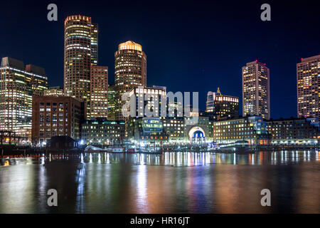 Boston Harbor and Financial District skyline at night - Boston, Massachusetts, USA Stock Photo