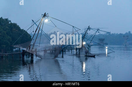 Chinese fishing nets at dusk, Kerala Backwaters, India Stock Photo