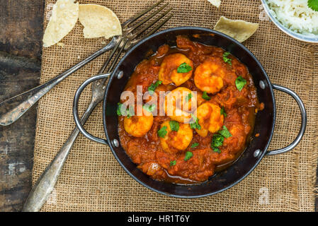 Prawn curry with rice and popodoms Stock Photo