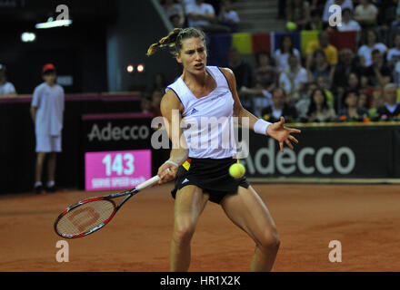 CLUJ-NAPOCA, ROMANIA - APRIL 16, 2016: German tennis player Andrea Petkovic plays against Simona Halep during a Fed Cup match in the World Cup Play-Of Stock Photo