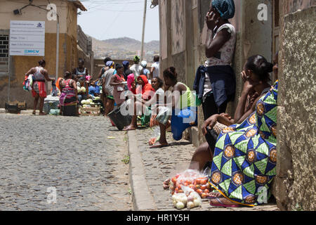 African women selling fruits and vegetables outdoors market in Praia, Cape Verde. Stock Photo