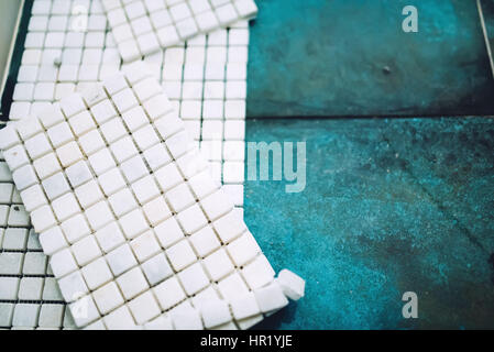 White marble stone, mosaic tiles ready for installation Stock Photo