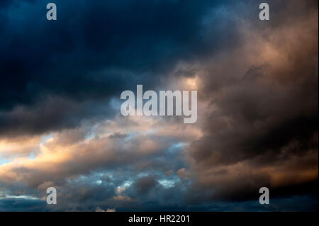Cumulus conjestus clouds at sunset Stock Photo