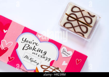 Box of You're Baking me Crazy Mr Kipling bakewell tart slices for valentines day with one pack removed set on white background Stock Photo