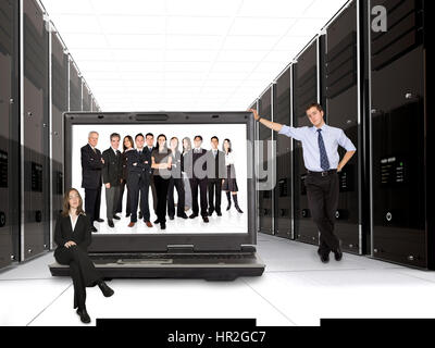 business online network team - 3d servers and a huge business team on a laptop Stock Photo