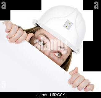 curious architect looking over white card over a white background Stock Photo