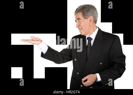 business man showing an imaginary product on his hand Stock Photo