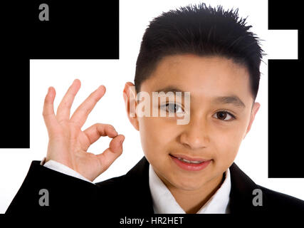 business boy doing the ok sign with his hand over a white background Stock Photo