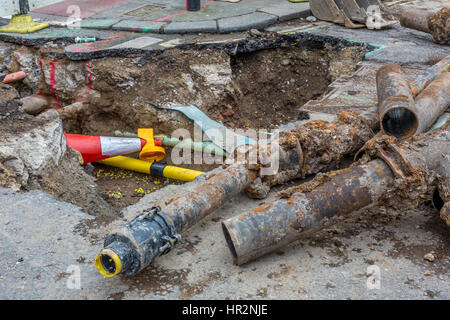 Road work and pipe replacement London England UK Stock Photo