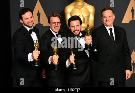 Robert Legato, Adam Valdez, Andrew R Jones and Dan Lemmon with the award for Visual Effects for The Jungle Book in the press room at the 89th Academy Awards held at the Dolby Theatre in Hollywood, Los Angeles, USA. Stock Photo