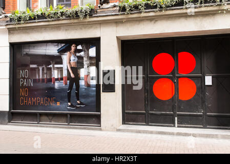 'No pain, no champagne' motto on the new Sweaty Betty European flagship store on 1 Carnaby street, London, UK Stock Photo