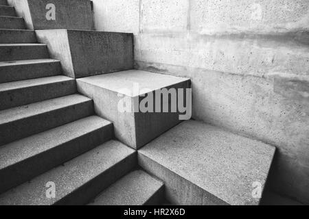 Concrete staircase as abstract architectural background, monochromatic image Stock Photo