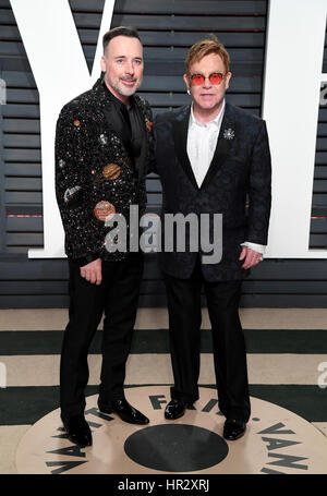 Elton John and David Furnish arriving at the Vanity Fair Oscar Party in Beverly Hills, Los Angeles, USA. Stock Photo