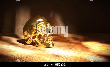 golden skull on wood Stock Photo