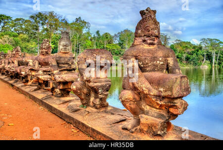 Guardians at the South Gate of Angkor Thom - Siem Reap, Cambodia Stock Photo