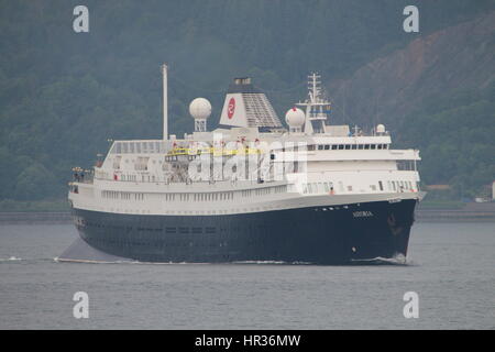 MV Astoria, a cruise ship operated by Cruise and Maritime Voyages, passes Cloch Point on the Firth of Clyde. Stock Photo