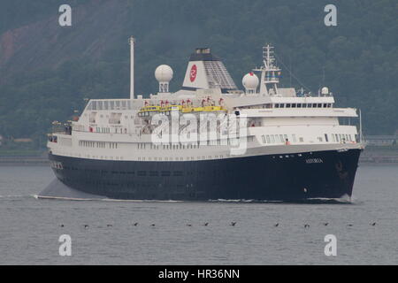 MV Astoria, a cruise ship operated by Cruise and Maritime Voyages, passes Cloch Point on the Firth of Clyde. Stock Photo