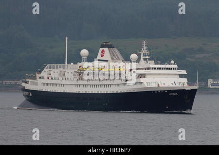 MV Astoria, a cruise ship operated by Cruise and Maritime Voyages, passes Cloch Point on the Firth of Clyde. Stock Photo