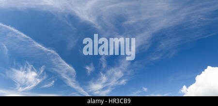 Patterned white clouds in a blue sky Stock Photo