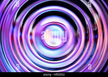 Abstract background with blue defocused concentric circles Stock Photo