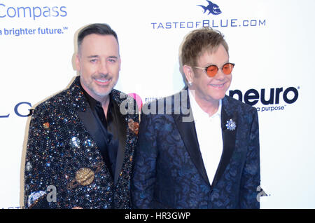 Los Angeles, California, USA . 26th Feb, 2017.   Host Elton John and Chairman David Furnish smile on the red carpet for the 2017 Elton John AIDS Foundation Academy Awards Viewing Party. Credit: The Photo Access/Alamy Live News Stock Photo