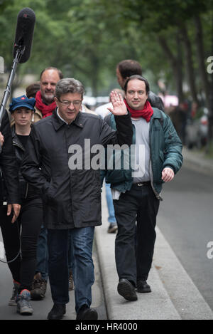 the Electoral Meeting  Place Stalingrad , Jean-Luc Mélenchon with collaborators crosses rue de paris Stock Photo