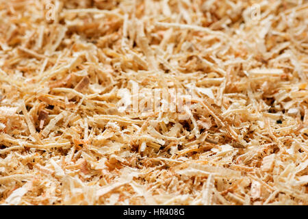 Wooden sawdust texture close up. Abstract background. Stock Photo