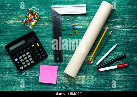 Project drawings on wooden background, top view Stock Photo