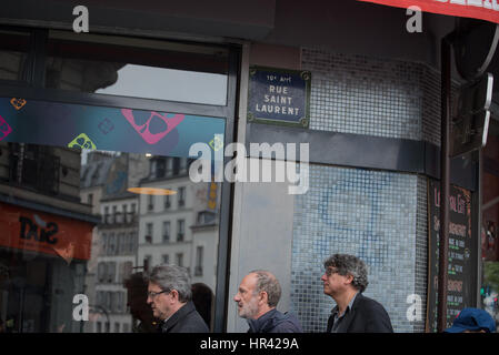 the Electoral Meeting  Place Stalingrad , Jean-Luc Mélenchon with collaborators crosses rue de paris Stock Photo