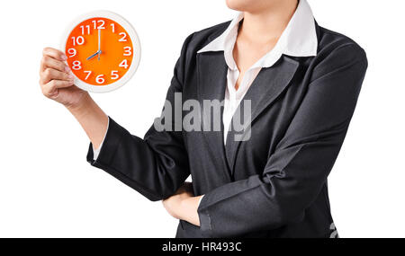 Business woman holding clock isolated on white background, Saved clipping path. Stock Photo