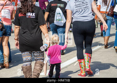 HOUSTON, TX/USA NOVEMBER 12, 2016: Participants in The 2016 Boot Walk to End Cancer held by The University of Texas MD Anderson Cancer Center Stock Photo