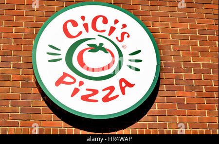 Cici's Pizza Sign on red brick wall Stock Photo