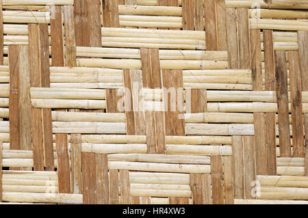 woven bamboo wall panel with diamond pattern Stock Photo