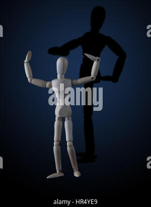 Wooden figurine flexing muscles in bodybuilder pose with shadow showing a different pose on dark background Stock Photo